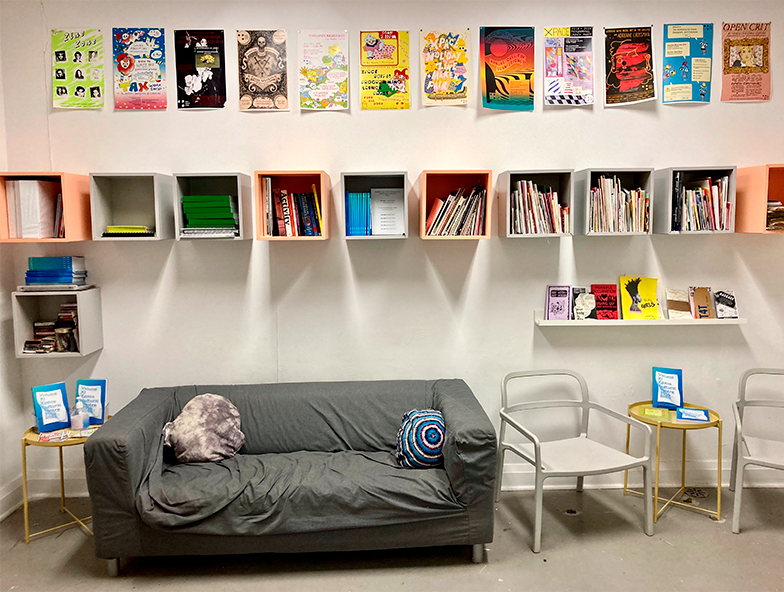 XPace Zine Library - showing art, bookshelves, couch